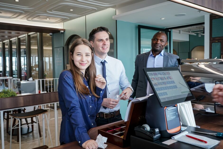 Professional front desk staff greeting clients with clear communication and friendly service