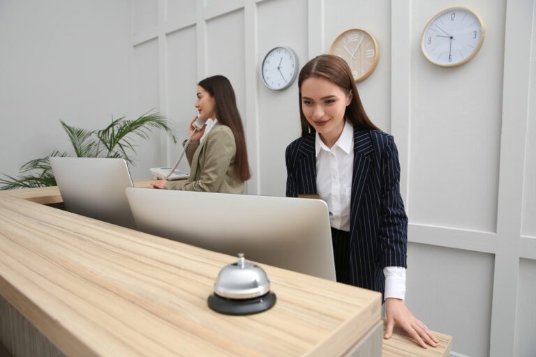 Front desk staff assisting visitors at a commercial property in Washington DC