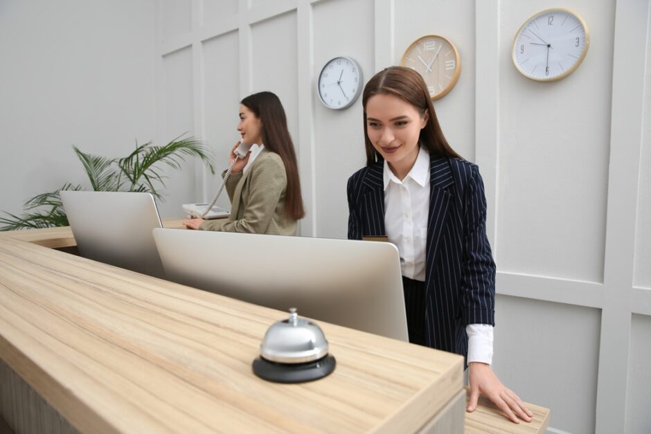 Front desk staff assisting visitors at a commercial property in Washington DC
